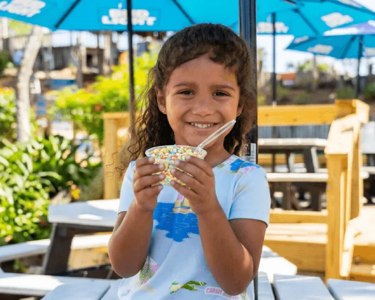 little girl eating dippin dots